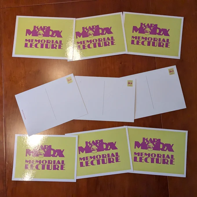 Photograph of six 'Karl Marx Memorial Lecture' postcards. The top and bottom three show the cover (with the previous text), the middle three show the reverse, a blank postcard.