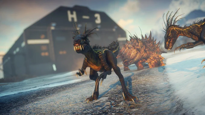 Two raptors and an ankylosaurus stand in front of an air hangar-