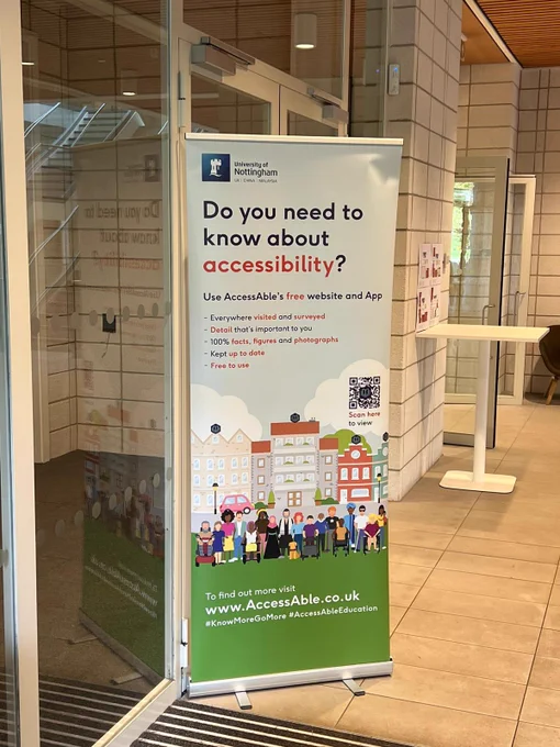 AccessAble’s promotional banner stand with the headline “Do you need to know about accessibility”. The stand is situated just inside the main entrance to the Performing Arts Space within the Monica Partridge Building.