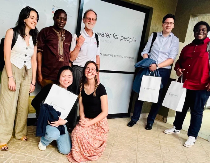 The Imperial College London team left to right: Maria Koulouri (PhD student), Nadia Angelica (MEng student 2023), Elsa Germain (MEng student 2023), Prof Michael Templeton, Benjamin Okoko (MEng student 2023) with independent sanitation consultant Jeff Broome at the Water for People Kigali office to meet Country Director Eugene Dusingizumuremyi (center left).