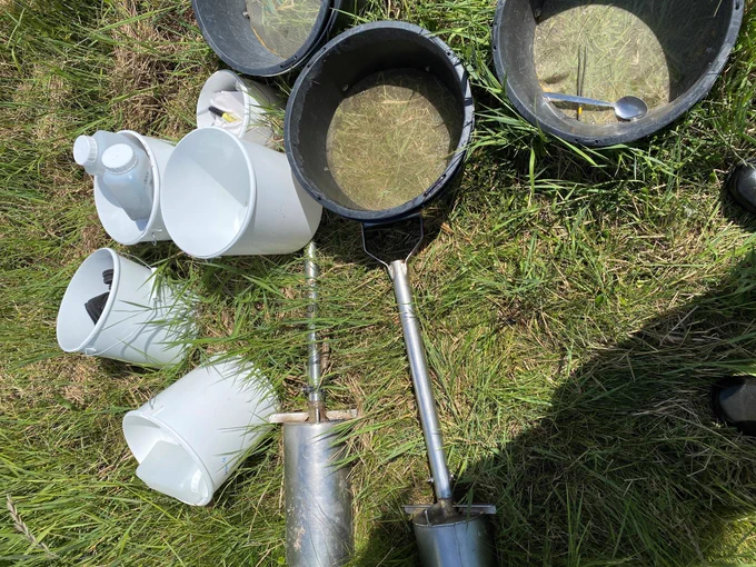 A collection of buckets and equipment for fieldwork in Gyldensteen Lagoon in Denmark. Andrea Lo has been working with the Ecology Lab at the University of Southern Denmark in the research of the effects of clay and silt on species diversity in the lagoon. Photo by Andrea Lo