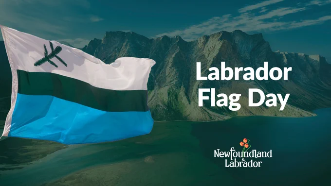 a photo of mountains and water and the labrador flag is waving. the text reads labrador flag day. 