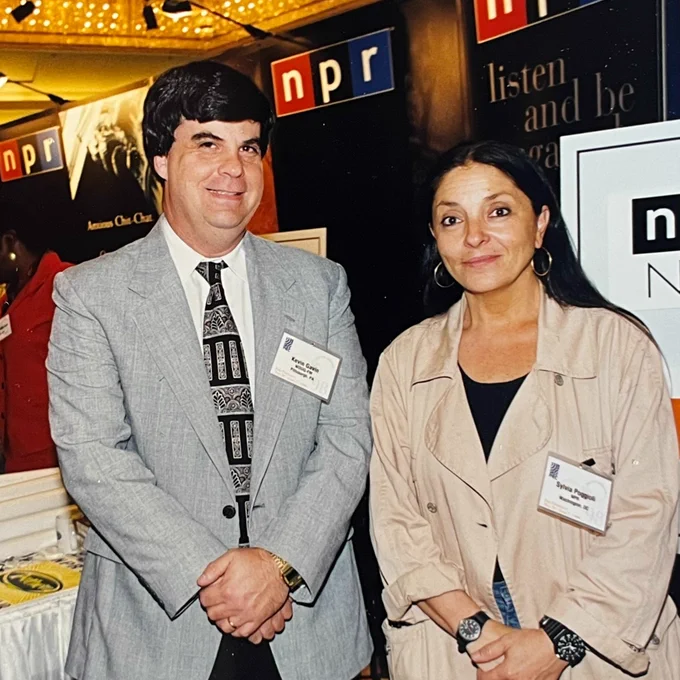Kevin Gavin and Sylvia Poggioli at a public media conference in 1998