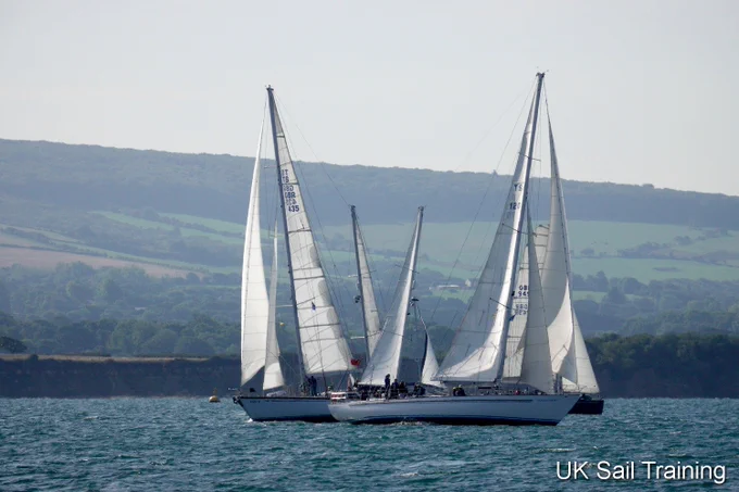 Donald Searle and Rona II racing under full sail in the Solent.

