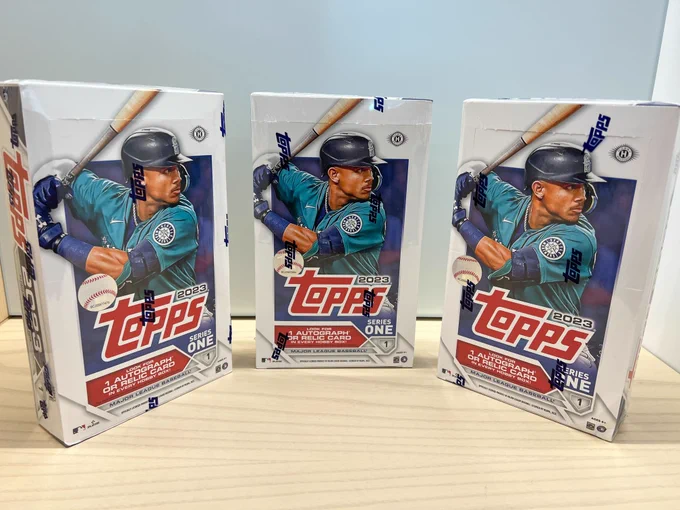 Three Topps Series 1 hobby boxes with Julio Rodríguez in a teal Mariners jersey on the front cover. 