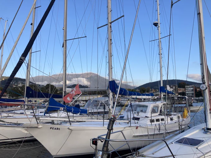 Blue sky over kunanyi with boats in the foreground