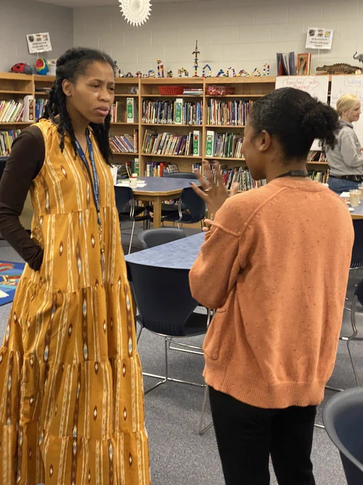 Two teachers reflecting