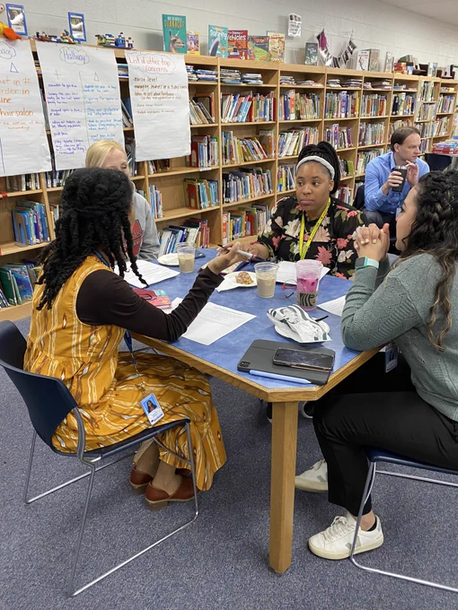 Teachers having a reflective discussion