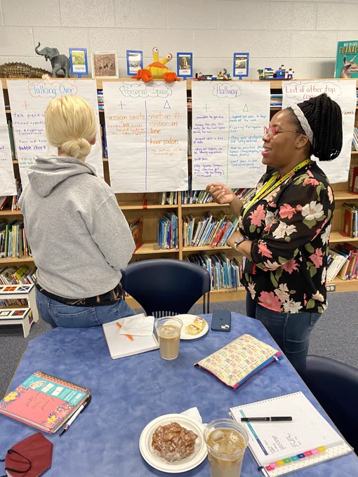 Two teachers talking about classroom management