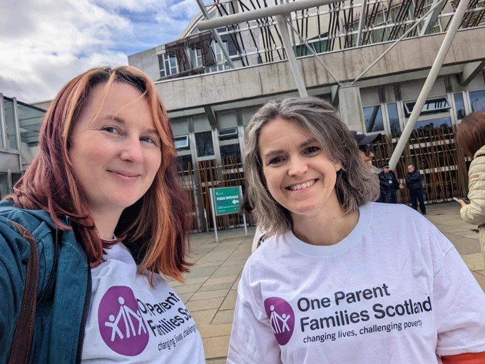 OPFS parent participation worker Marissa with single parent and councillor Martha Mattos-Coelho both wearing One Parent Families Scotland t-shirts 