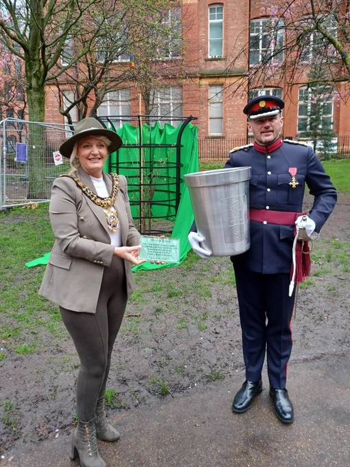 A photo of the Lord Mayor and Deputy Lieutenant stood in front of the Tree of Trees