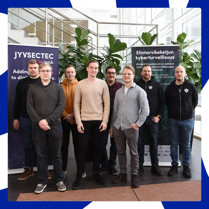 Elisa�s cybersecurity team standing for a photo at the event.