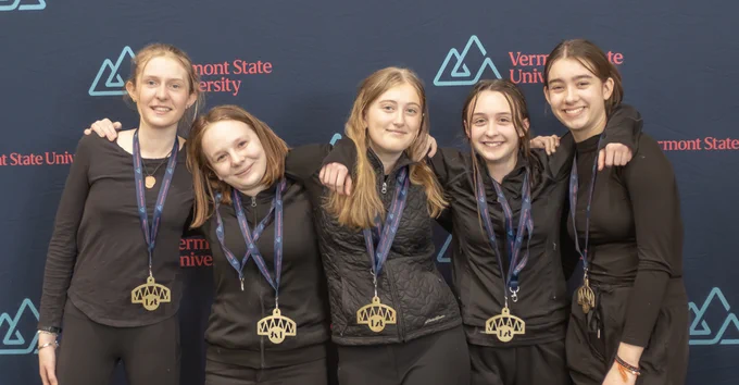 Team New Generation, five middle school students wearing their first place medals.