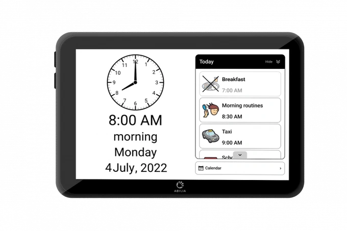Photo shows an Abilia clockface with time date and daily task list