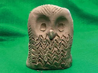 a clay owl