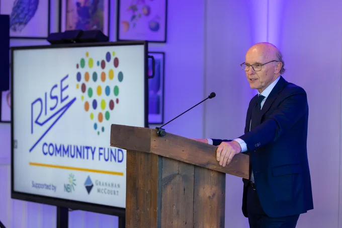 David McCourt speaks to grant recipients of the Rise Community Fund