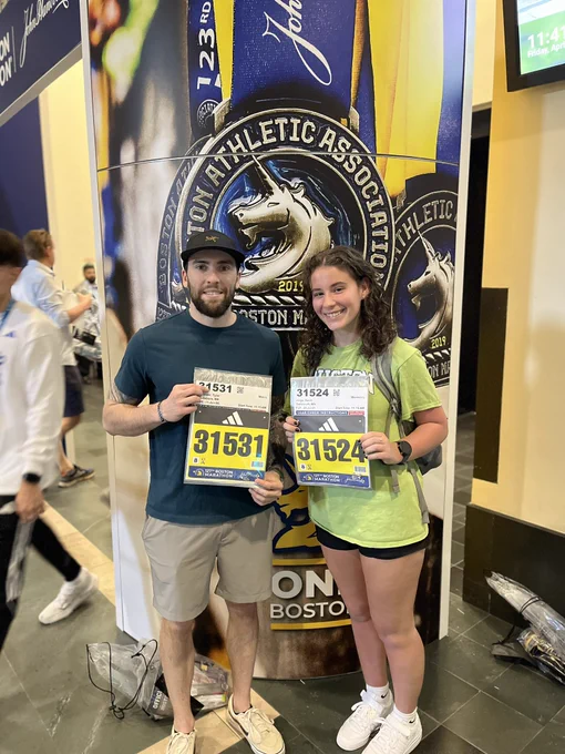 Boston Marathon runners pick up their race bibs.