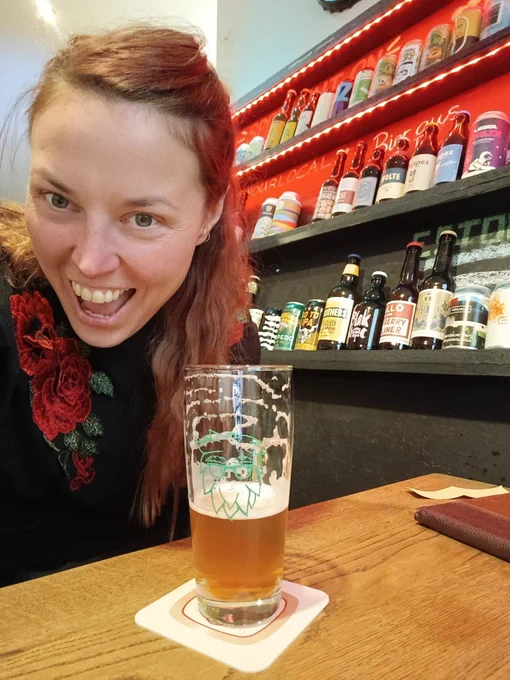 Selfie of yours truly with a beer, glass is slightly less than half full (or slightly less than half empty, depending on how you look at it)
