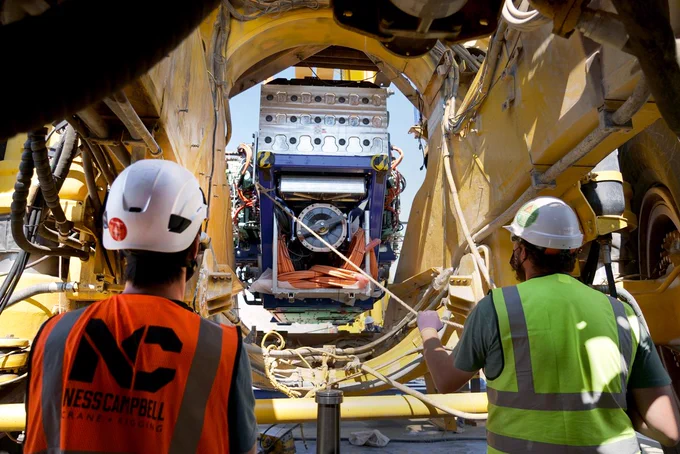 First Mode engineers helping install a hybrid clean energy powerplant into an ultra-class mining haul truck.