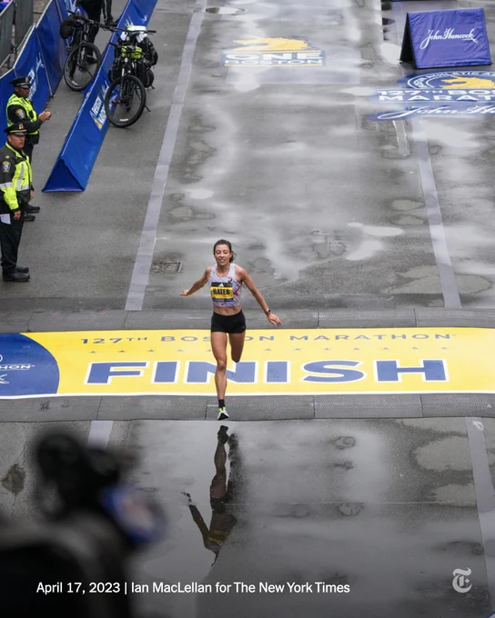 Emma Bates crossed the finish line at the Boston Marathon on April 17, 2023. Photo by Ian MacLellan for The New York Times.