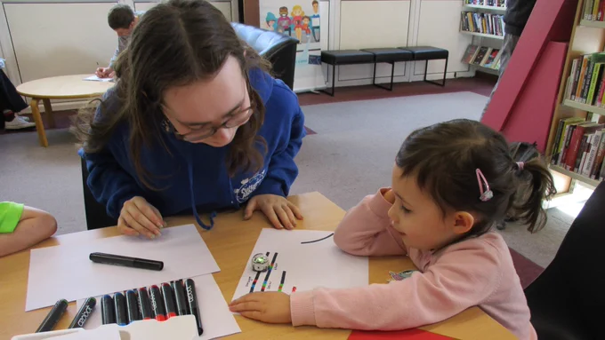 Young people with Ozobots.