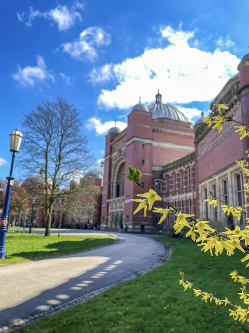 Exterior of Aston Webb at the University of Birmingham seen from the side with blue skies above
