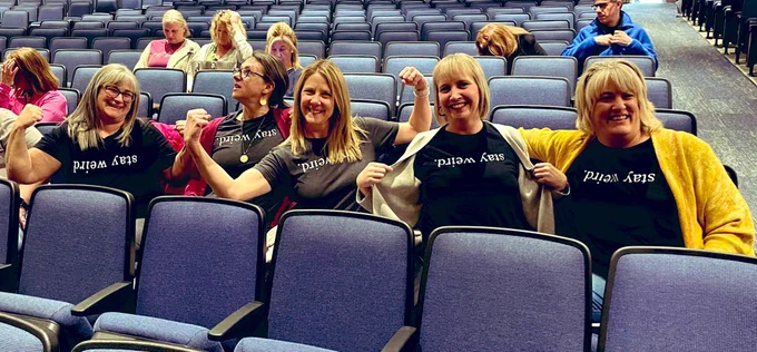 Julie, Lynn, Dana, Dyan & Christine wearing “Stay Weird” shirts