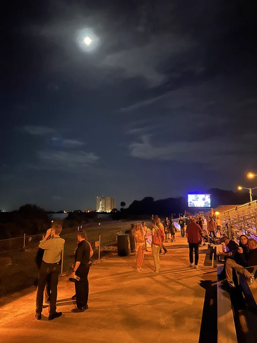 Viewing stands with NASA building in the background.