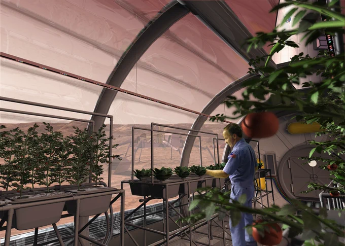 Dr. Ray Wheeler tending to crops in a Martian greenhouse