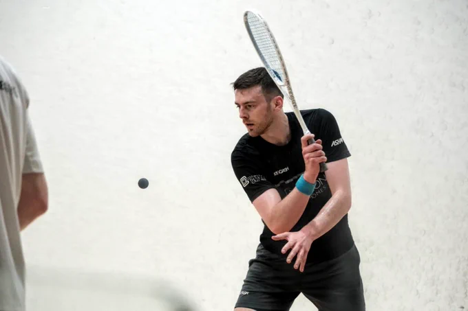 Patrick Rooney serves during his first round match against Todd Harrity at the British Open