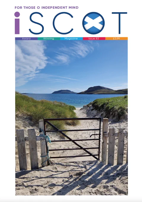 Picture of a closed gate  in front of a grassy dune leading to a white sandy beach leading to an azure blue water under a clear blue sky, taken September 2022