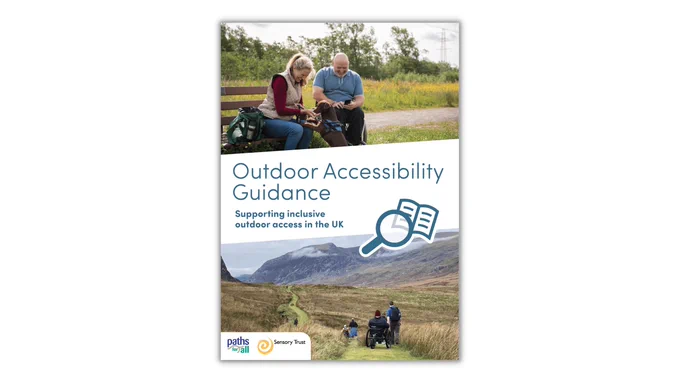 The front page of the new guidance features the following text 'Outdoor Accessibility Guidance, Supporting inclusive outdoor access in the UK' alongside photos of walkers and wheelchair users enjoying the outdoors. The Paths for All and Sensory Trust logos feature at the bottom left of the page.