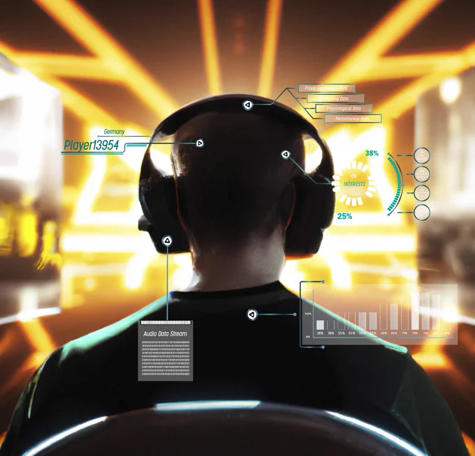 Picture of a male gamer with headphones, seen from behind, sitting in front of a screen or some kind of arcade (background is a bit blurry with bright yellow lights). On the picture, as an extra layer, there are statistics about his interests and personal data - like in a presentation. Also, there are tables and texts about the stimuli he is exposed to (auditory, visual, etc). Picture provided by Chrlotte Knorr