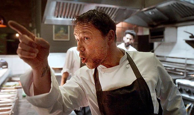 Stephen Graham pointing angrily as he plays a chef in the film Boiling Point