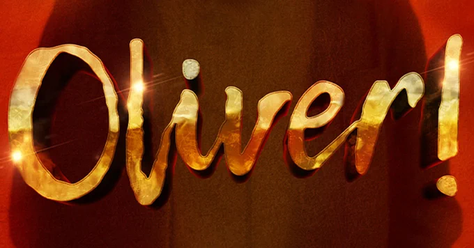 A photo showing artwork for Oliver!