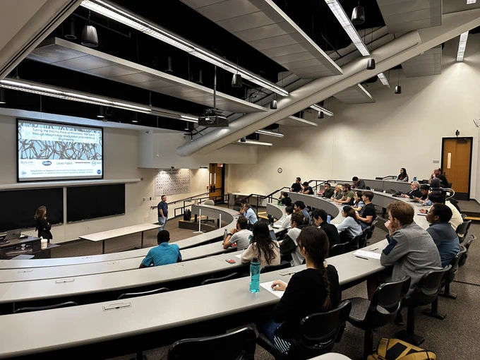 Laura Fabris presents to a room of graduate students at Rice University