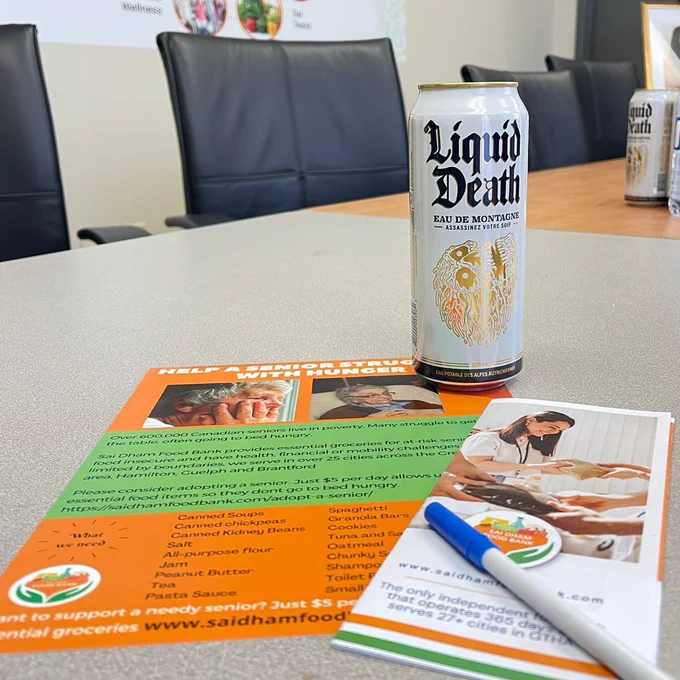 Liquid Death in the board room meeting at Sai Dham Food Bank Canada