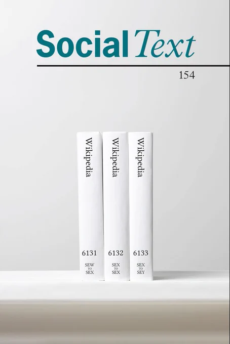 Cover of "Social Text issue 154." Three white books titled "Wikipedia" stand upright, centered on a white shelf with white background. The journal title, Social Text, appears in the top-center in turquose text.