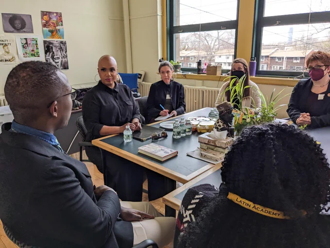 Rep. Ayanna Pressley sits with Boston Latin Academy leaders during her visit. 
