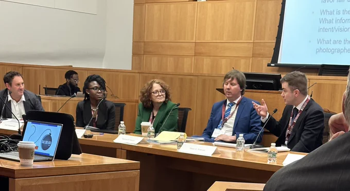 Five people in a panel discussion