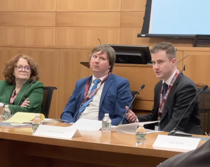 Close up of three people in a panel discussion