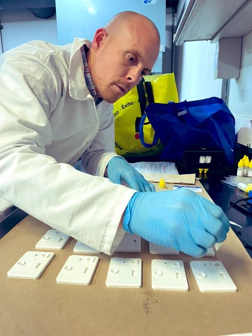 Dr. Beatty working in a lab in Medellin, Colombia. 