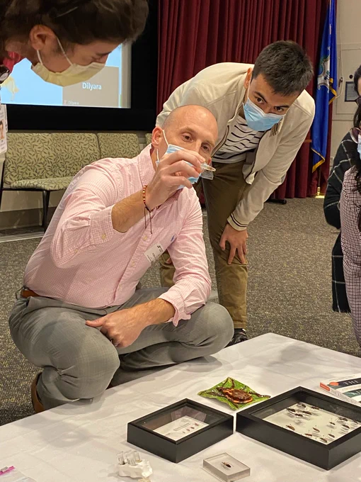 Dr. Beatty leading a lecture on Chagas and showing the kissing bugs. 