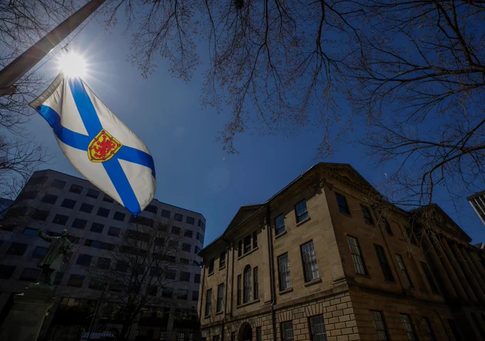 Photo showing the flag at Province House at half-mast