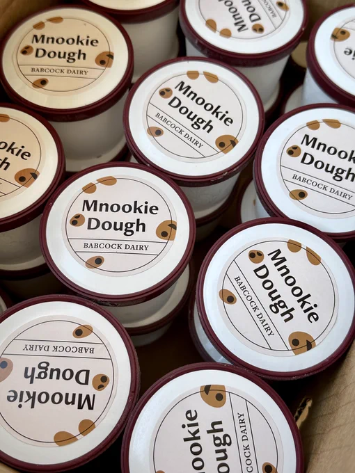 Photo of multiple Mnookie Dough ice cream cups from Babcock Dairy.