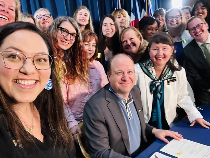We stopped to take a selfie right before Governor Polis signed SB188, SB189, and SB190 into law.