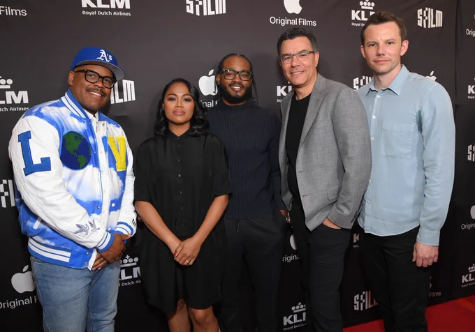 Red carpet setting. From left to right we have Erick J Payton, Zinzi Coogler, Ryan Coogler, Pete Nicks, and Sean Havey.