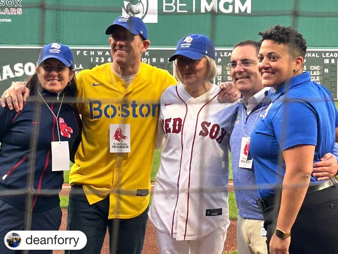 President Mary K.Boyd and Emmanuel College administrators at Fenway Park.