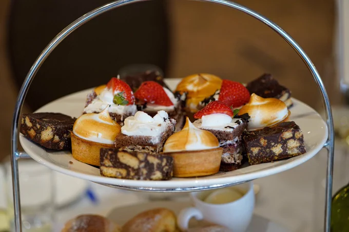 A selection of cakes on a plate from our fundraising event.