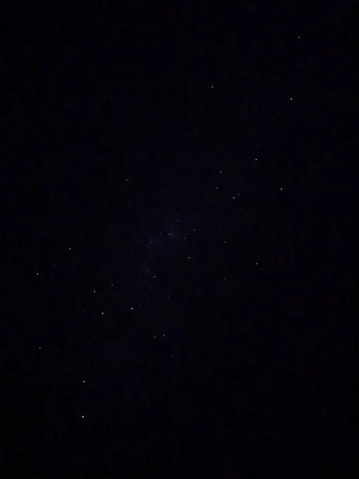 A jet black sky against which various stars and constellations are twinkling.